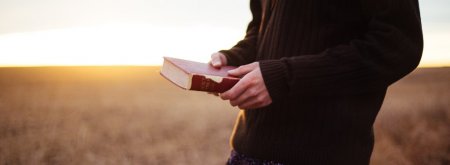 Man holding Bible