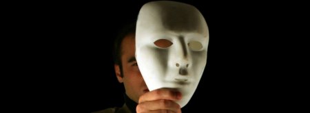 Man Holding Mask